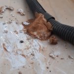 Unnecessary holes covered in a blob of silicone